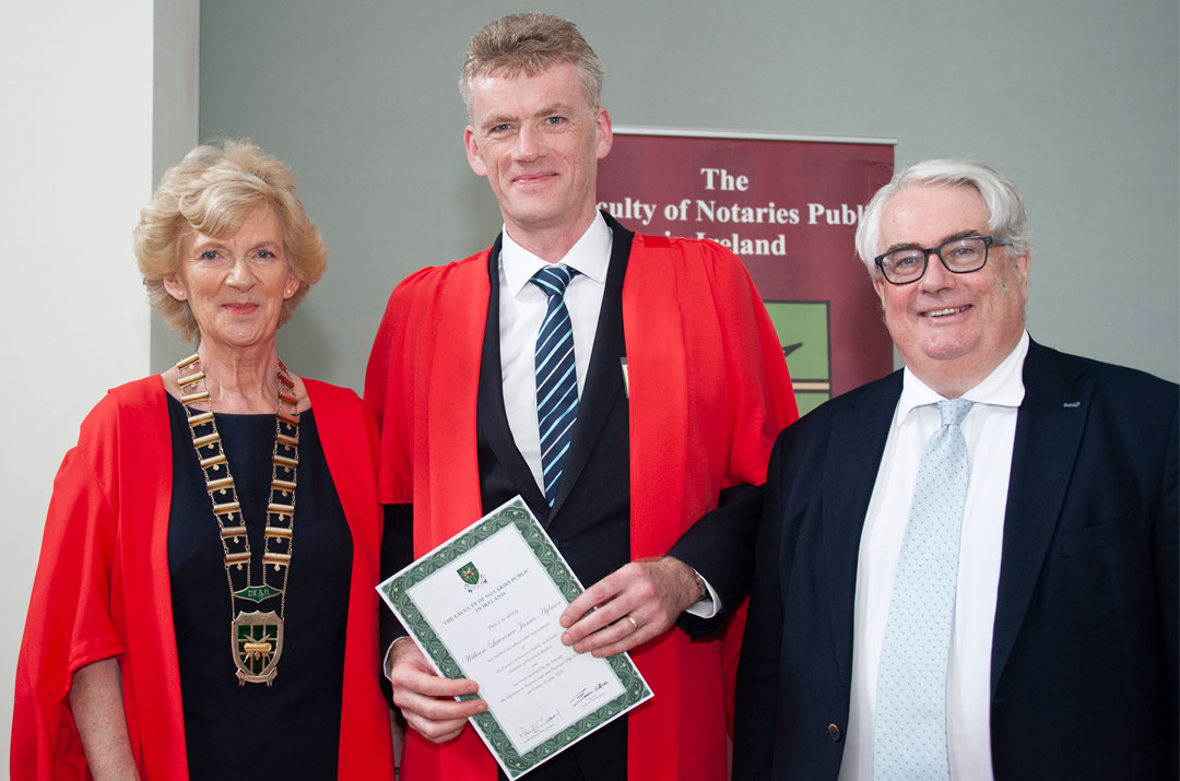 William receiving his diploma from Dean Mary Casey, Dean of the Faculty of Notaries Public in Ireland and The Hon. Mr Justice Frank Clarke, Chief Justice and President of the Supreme Court of Ireland.